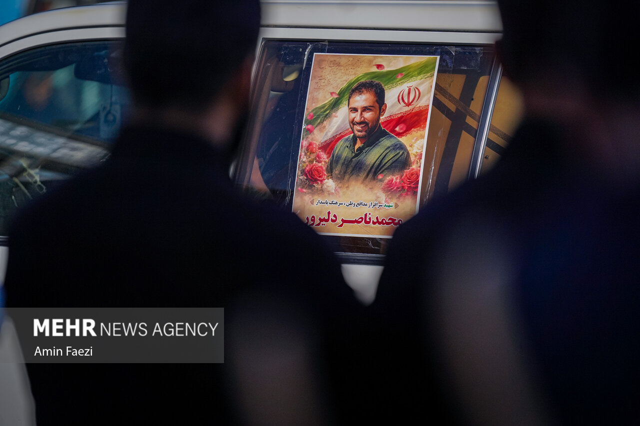 تشییع پیکر پاسدار شهید «محمد ناصر دلیرور» در حرم شاهچراغ(ع)